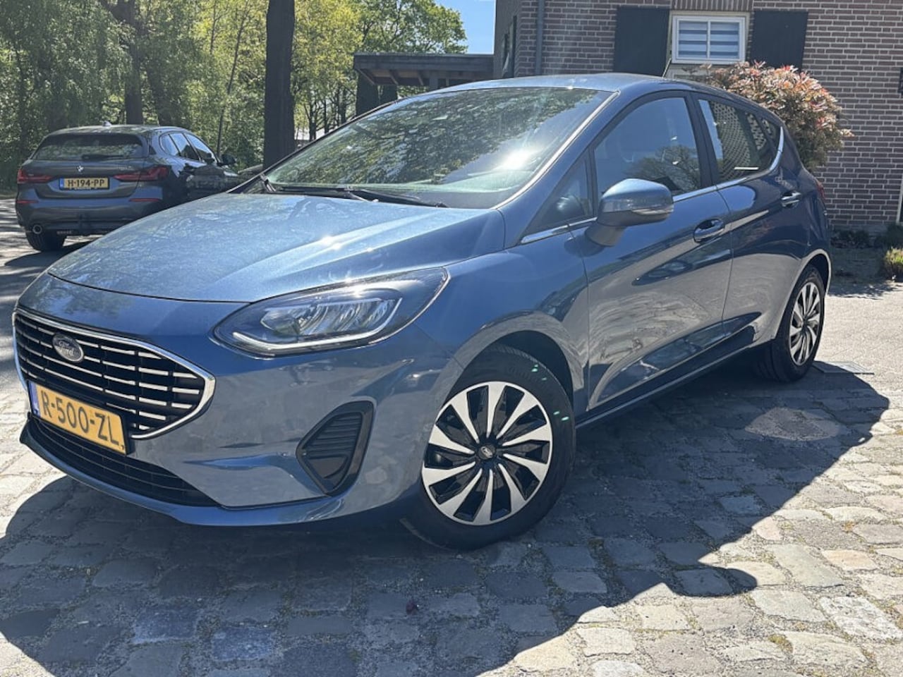 Ford Fiesta - 1.0 125pk Hybrid Titanium ecc,navigatie,pdc,cruise,sportdop - AutoWereld.nl