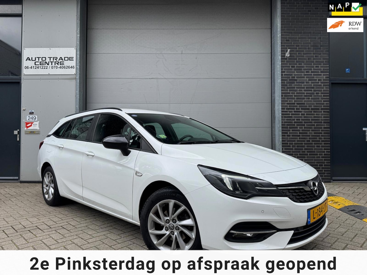 Opel Astra Sports Tourer - 1.2 Edition [Dealer OH | Carplay | PDC | Cruise | Navi | Trekhaak] - AutoWereld.nl
