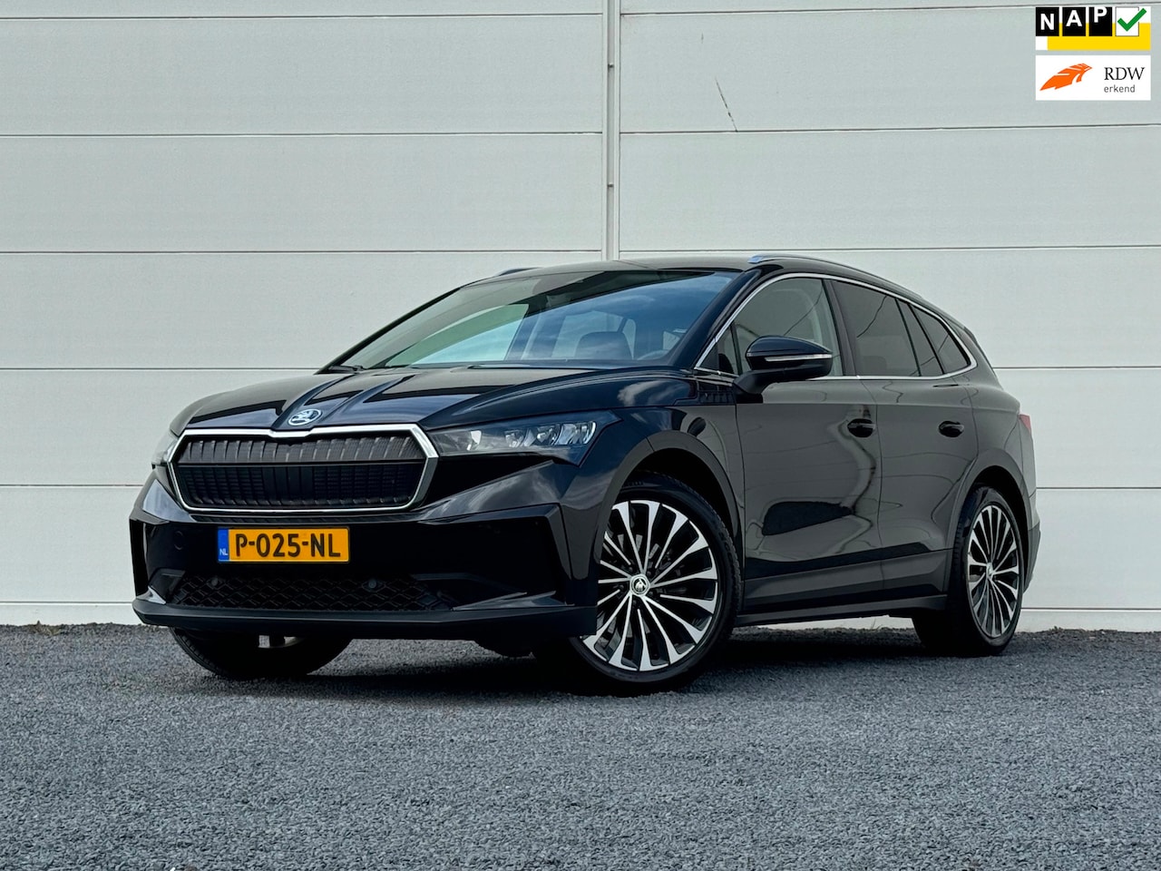 Skoda Enyaq iV - 80 Org NL SOH 96% Warmtepomp Keyless Camera Sportonderstel Lane assist Dodehoek detectie S - AutoWereld.nl