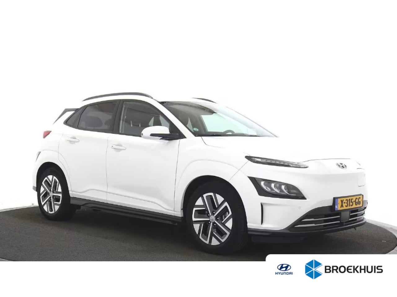 Hyundai Kona Electric - EV Business 64 kWh | Lederen bekleding | Trekhaak | | Achteruitrijcamera | Airco (automati - AutoWereld.nl
