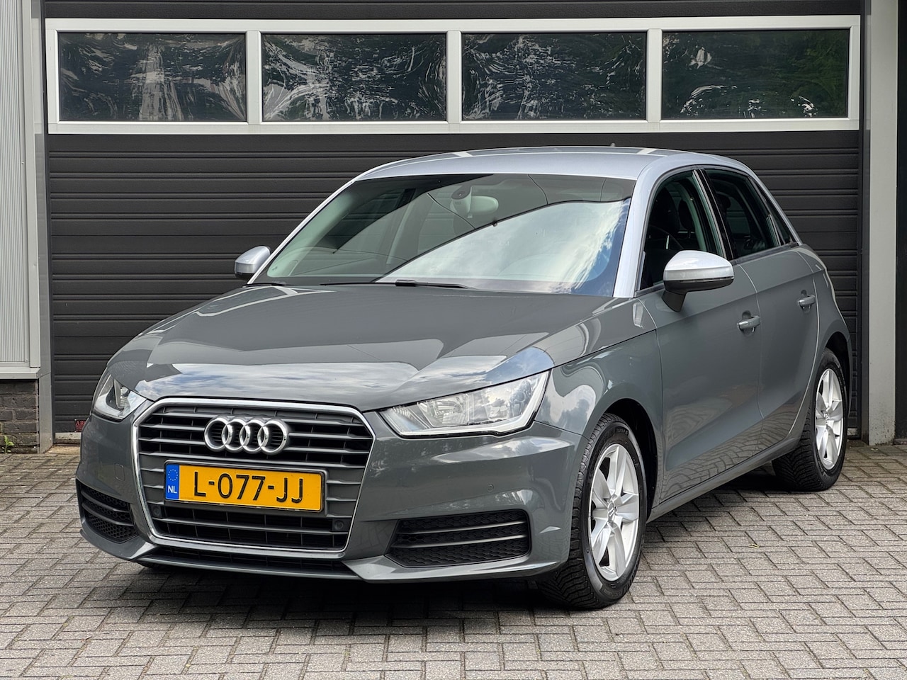 Audi A1 Sportback - 1.0 TFSI Navi, Airco, Cruise, PDC - AutoWereld.nl