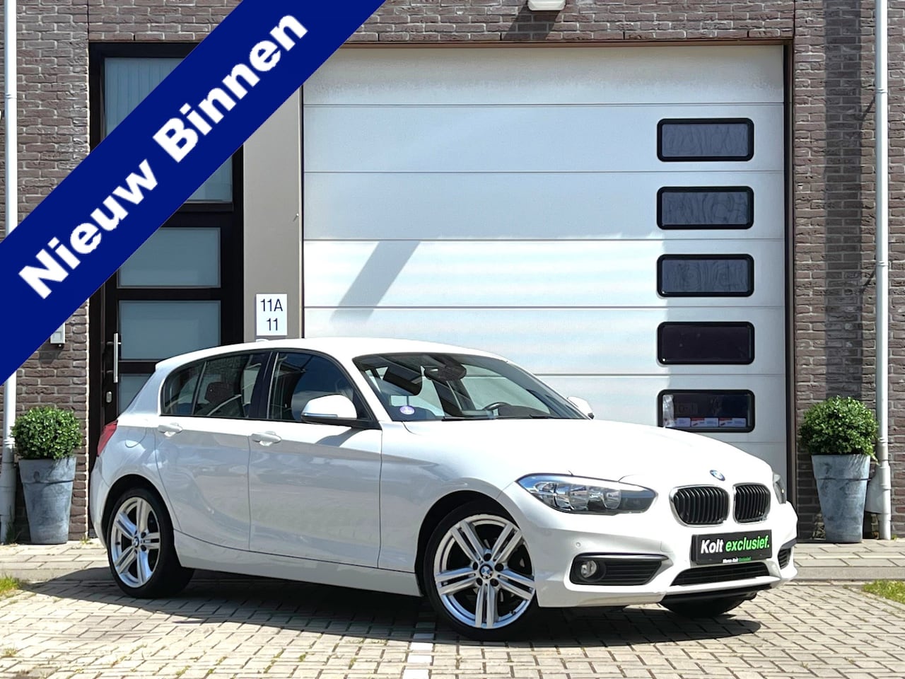 BMW 1-serie - 118i M Sport Turbo 136 PK 5 Deurs | Airco | Navigatie | 17" M-Sport Velg | Park Sensors | - AutoWereld.nl