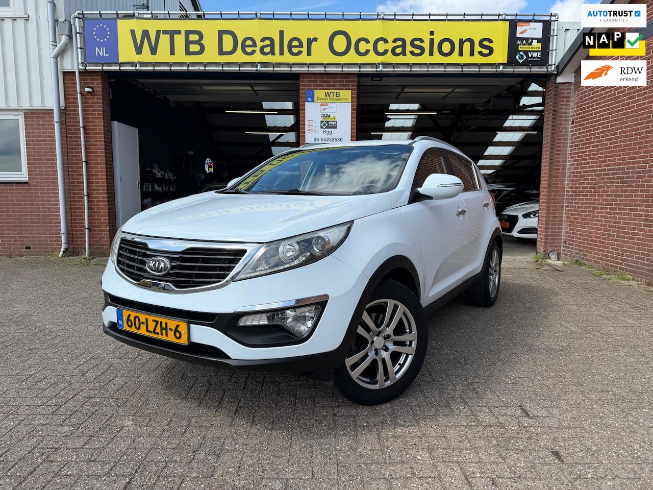 Kia Sportage - 2.0 X-ecutive Plus Pack 2.0 X-ecutive Plus Pack, 1 Eig, Dealer Onderh. Half Leder, Airco-ECC, Cruise Control - AutoWereld.nl