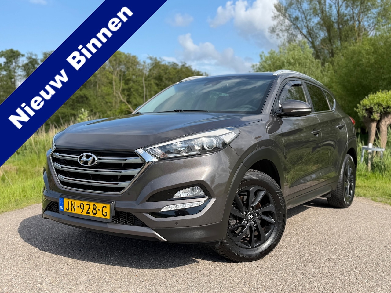 Hyundai Tucson - 1.6 GDi Comfort / Navigatie / Camera / Cruise Control / Climate Control / Stoelverwarming - AutoWereld.nl