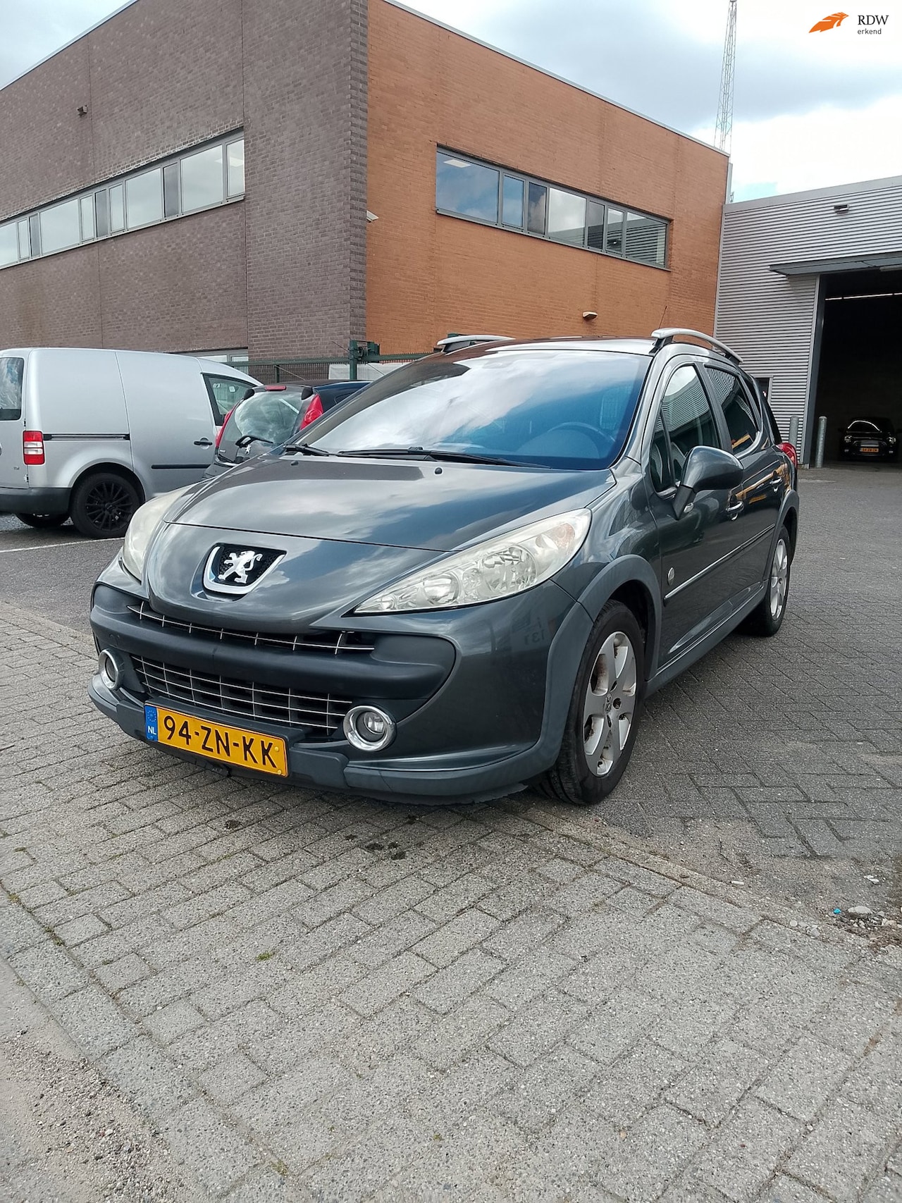 Peugeot 207 SW Outdoor - 1.6 VTi XS 1.6 VTi XS - AutoWereld.nl