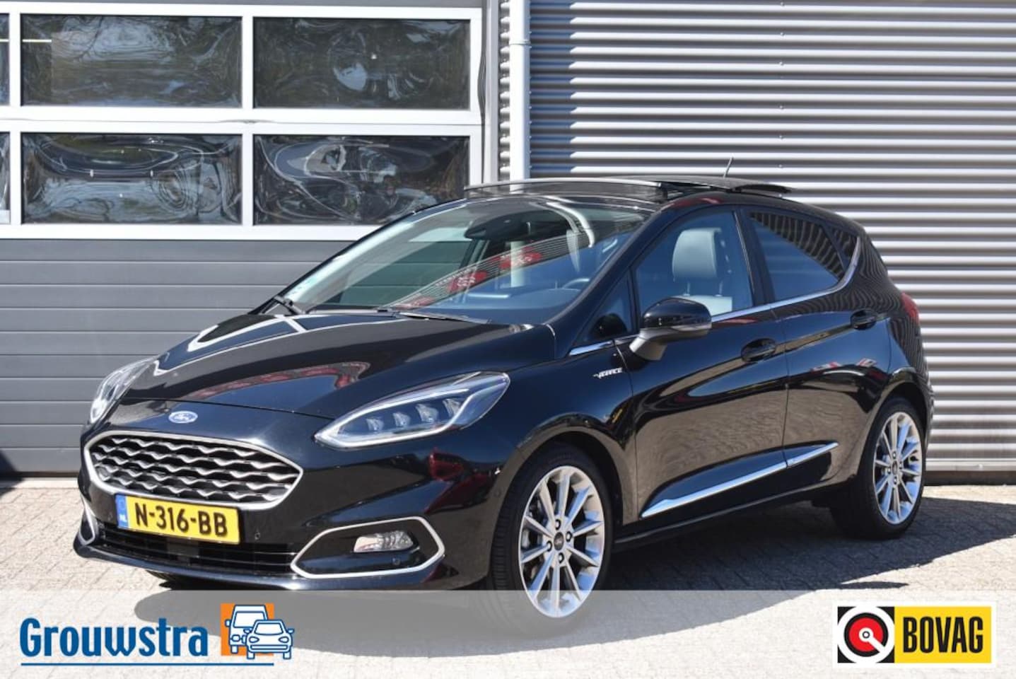 Ford Fiesta - 1.0 ECOBOOST HYBRID /  VIGNALE / LEDER / AUTOMAAT / PANO DAK - AutoWereld.nl
