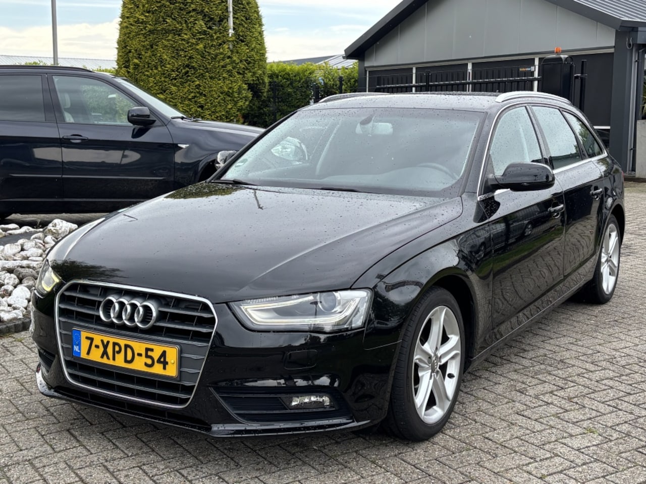 Audi A4 Avant - 2.0 TDI Ultra Business 2014 Zwart Trekhaak - AutoWereld.nl