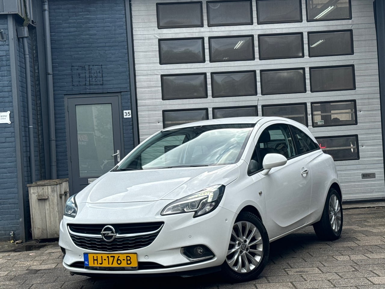 Opel Corsa - 1.4 Cosmo | Clima | Cruise | Camera | PDC | N.A.P - AutoWereld.nl