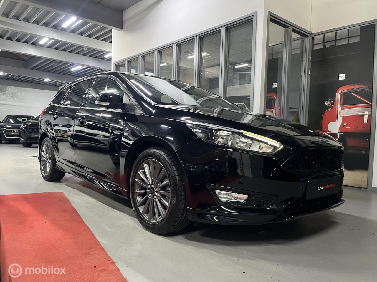 Ford Focus Wagon - 1.0 ST-Line 2017 NAVI PDC STUUR STOELVERW CLIMA - AutoWereld.nl
