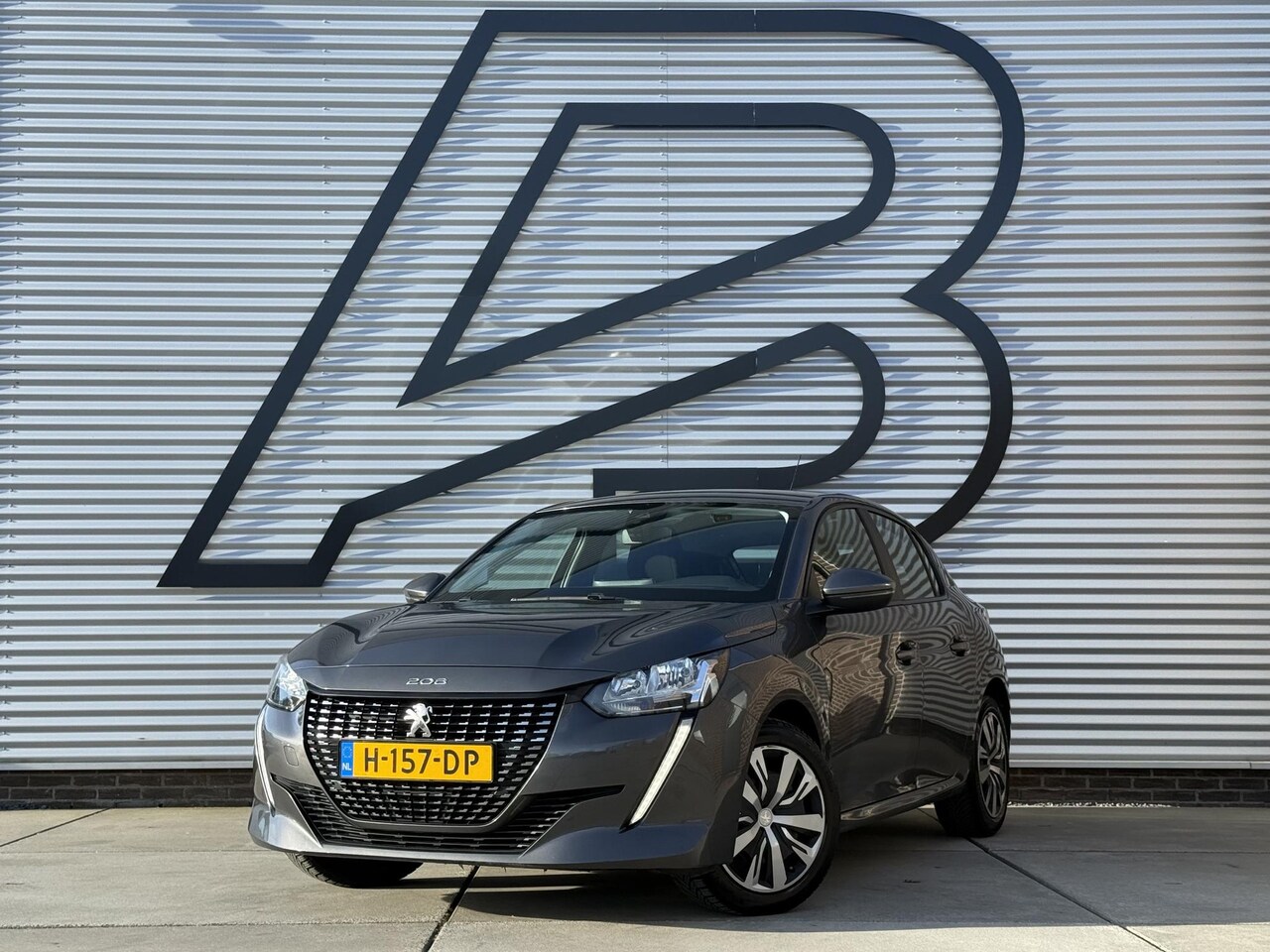 Peugeot 208 - 1.2 PureTech Active 2e Eigenaar|Navi|Carplay|Clima|Cruise|D-riem v.v. in 2023|N.A.P|Nieuwe - AutoWereld.nl