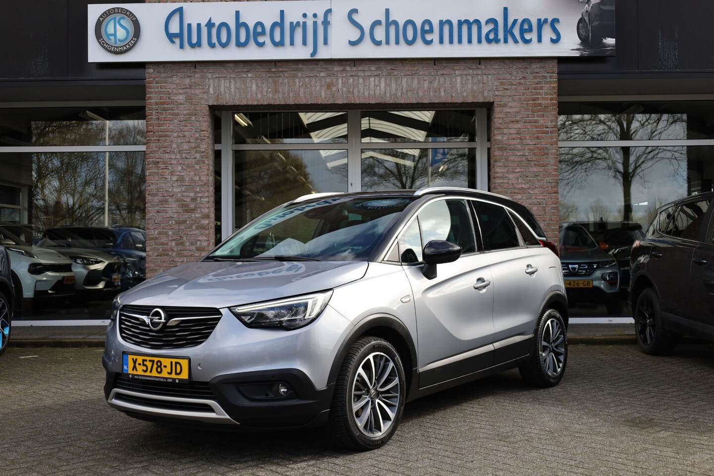 Opel Crossland X - 1.2 Innovation TREKHAAK DUO-TONE CARPLAY STUUR+STOELVERWARMING HALFLEER 17"LMV CRUISE CLIM - AutoWereld.nl