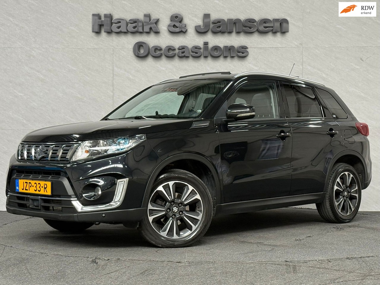 Suzuki Vitara - 1.0 Boosterjet Adventure Pano Leder Camera - AutoWereld.nl