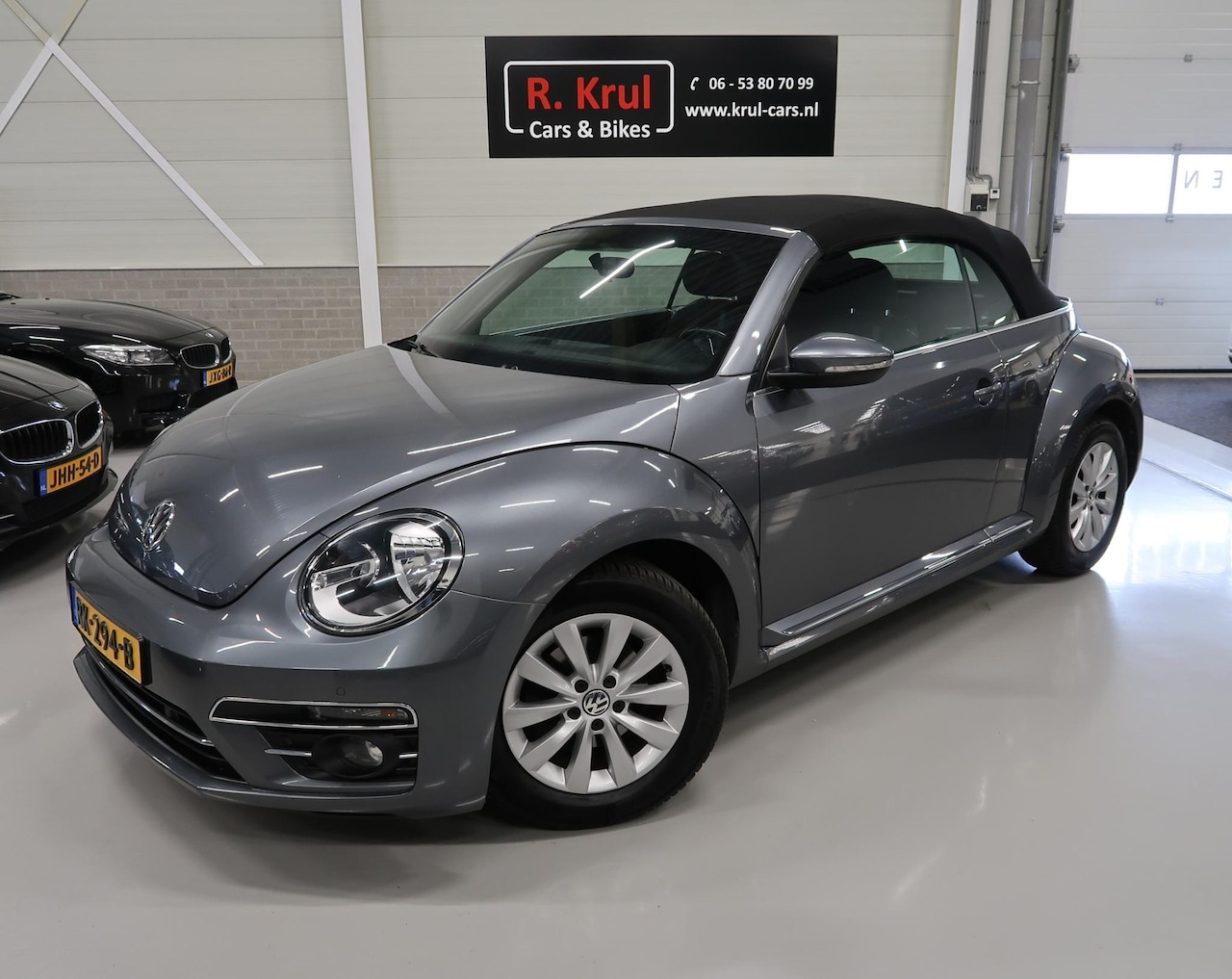 Volkswagen Beetle Cabriolet - 1.2 TSI Design Airco-ecc Stoelverwarming Navigatie Sportvelgen PDC Windscherm Boekjes aanw - AutoWereld.nl
