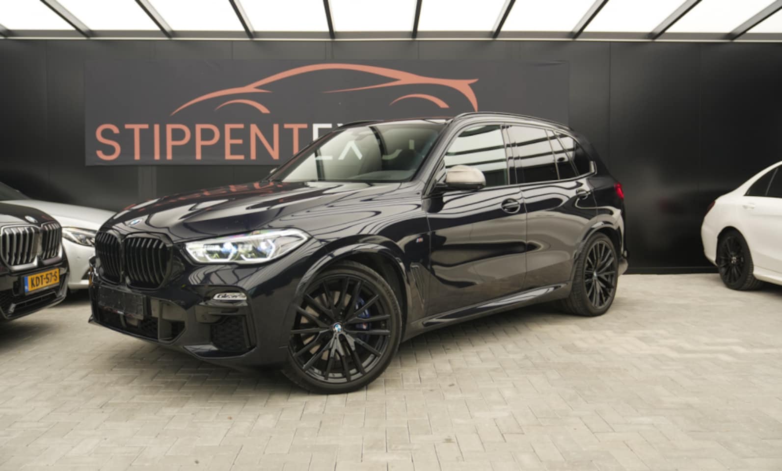 BMW X5 - M50I, V8, full option, pano, massage - AutoWereld.nl