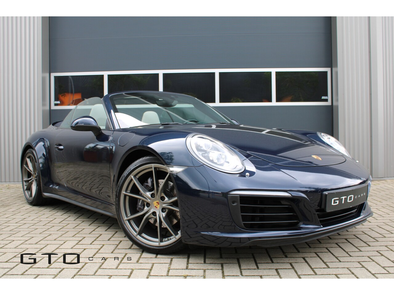 Porsche 911 Cabrio - 3.0 Carrera 4 | Bose | Sportuitlaat | Sport Chrono | Lederen interieurdelen - AutoWereld.nl