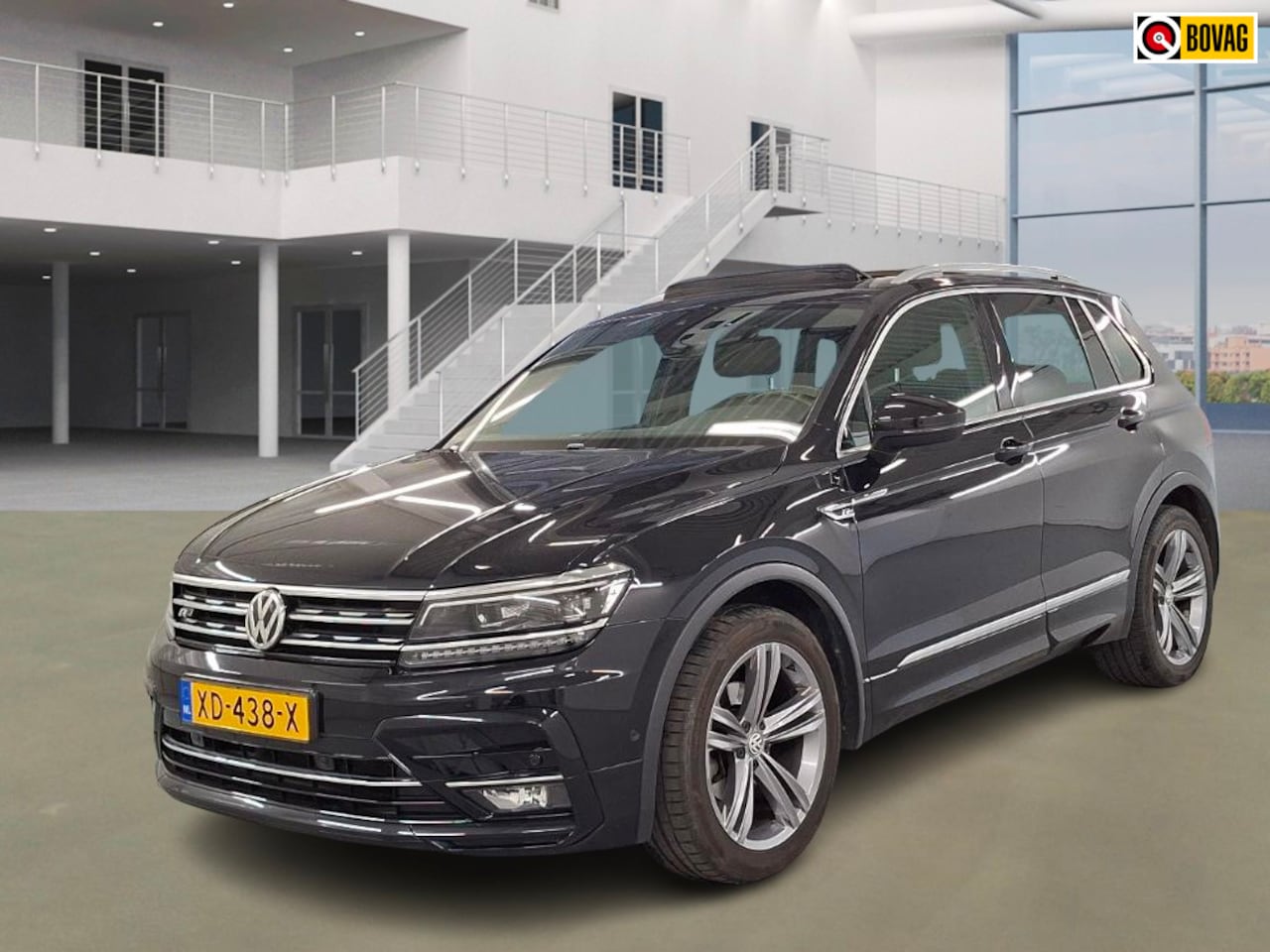 Volkswagen Tiguan - 1.5 TSI Highline Business R / PANO / DSG / TREKHAAK - AutoWereld.nl