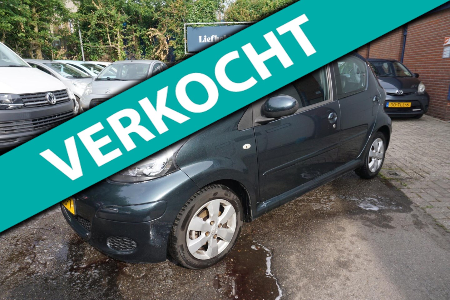 Toyota Aygo - 1.0-12V Aspiration Green Navigator / Airco / Leder/Alcantara - AutoWereld.nl