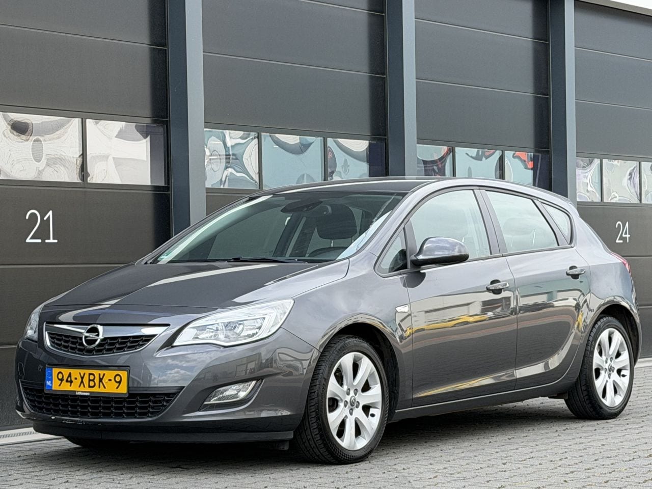 Opel Astra - 1.3 CDTI Cosmo Navi PDC - AutoWereld.nl
