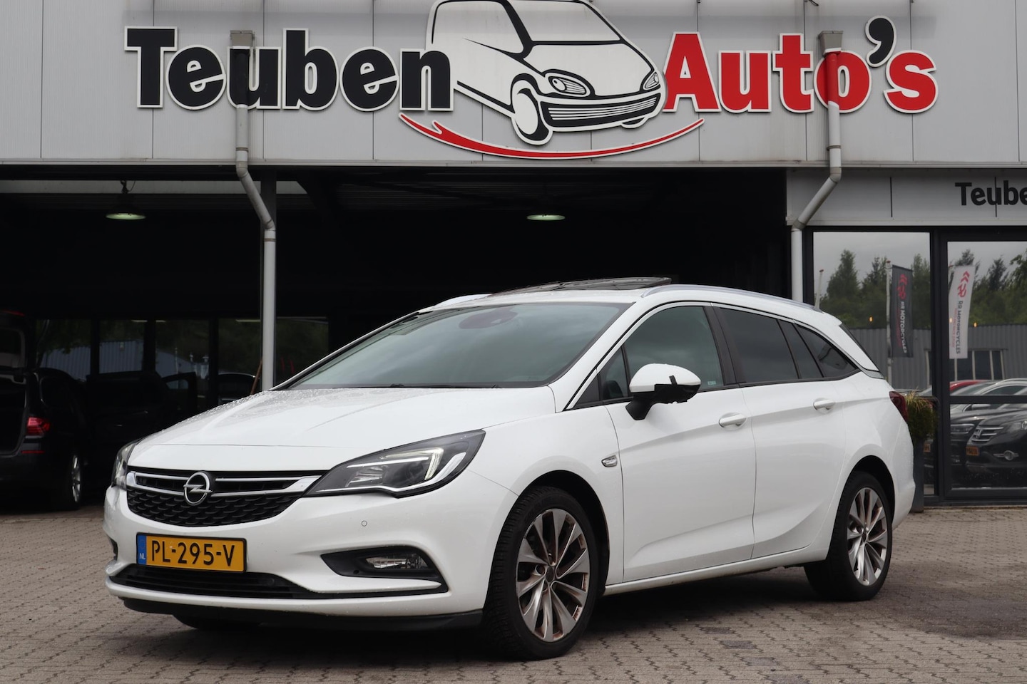 Opel Astra Sports Tourer - 1.0 Innovation | Navigatie | Schuif-/kanteldak | Camera | Cruise control | Climate control - AutoWereld.nl