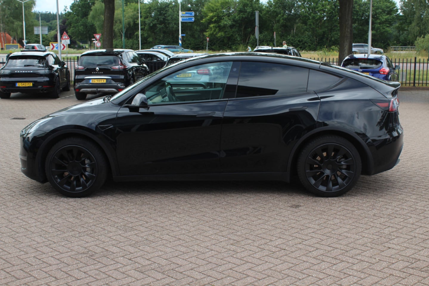 Tesla Model Y - Long Range AWD 75 kWh / Autopilot / Panoramadak / Camera / 20'' / Keyless / Leder / Dodeho - AutoWereld.nl