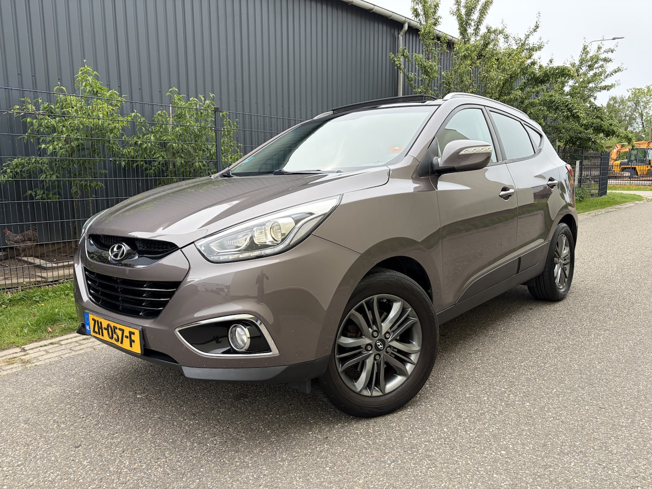Hyundai ix35 - 1.6i GDI Business Edition / NAVI / PANORAMADAK / STOELVERWARMING / 159dkm! - AutoWereld.nl
