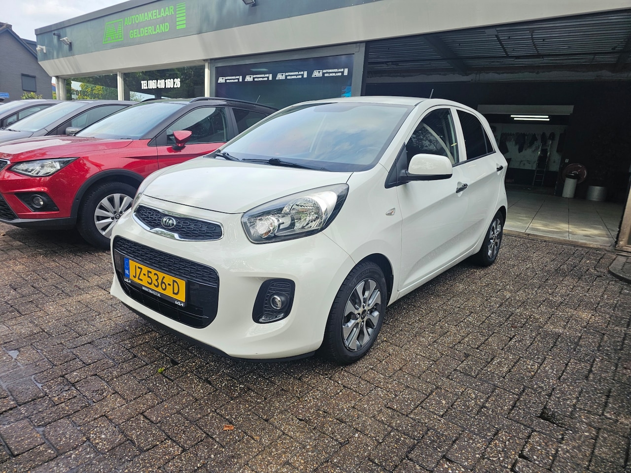 Kia Picanto - 1.0 CVVT ComfortPlusLine Navigator | 2E EIGENAAR | 12MND GARANTIE | CAMERA | NAVI | AIRCO - AutoWereld.nl