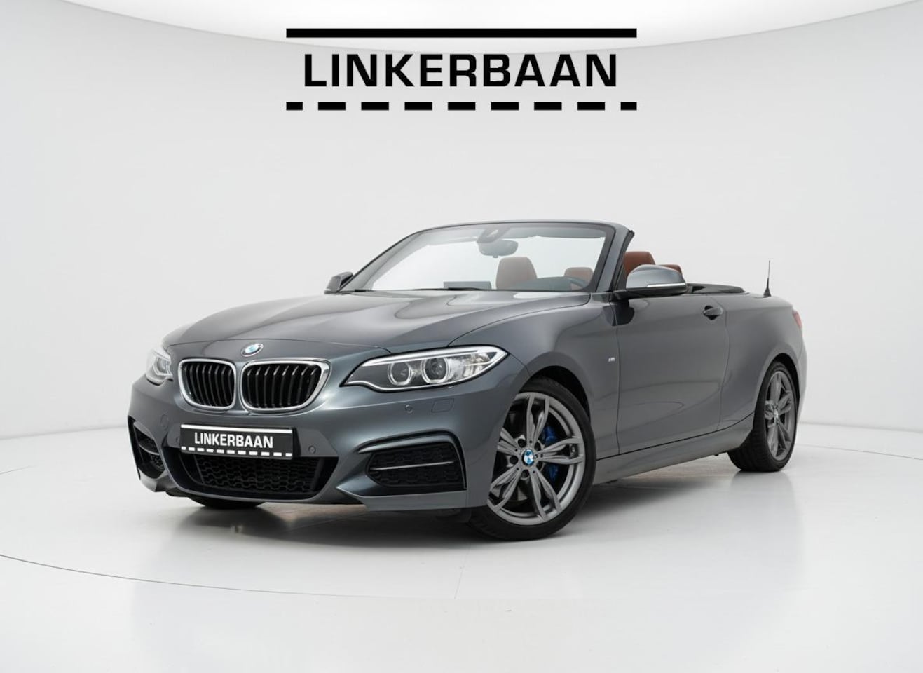 BMW 2-serie Cabrio - M235i Cabrio High Executive | Leder | H&K | Camera | Navi | 1 eig | NL Auto | - AutoWereld.nl