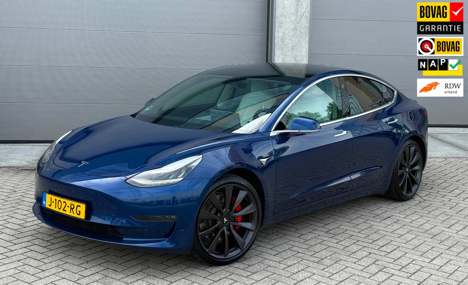 Tesla Model 3 - Performance AWD 75 kWh 2020 Blauw |WIT LEDER - AutoWereld.nl