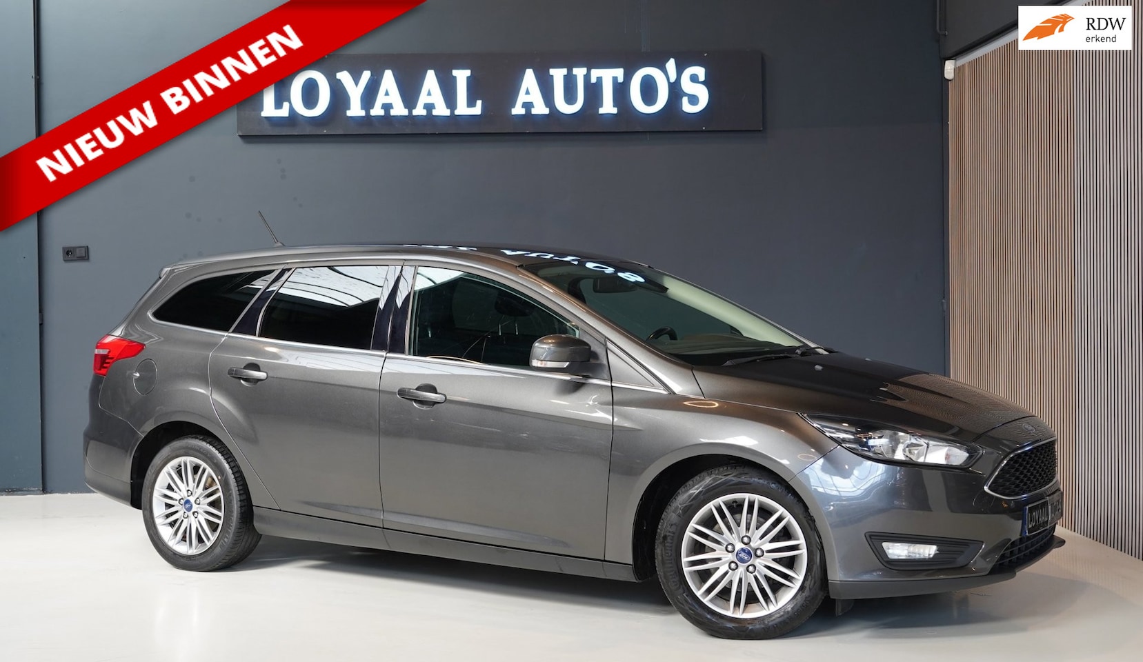 Ford Focus Wagon - 1.0 Titanium | NAVI | AIRCO | CRUISE | TREKHAAK | PDC | APK. - AutoWereld.nl