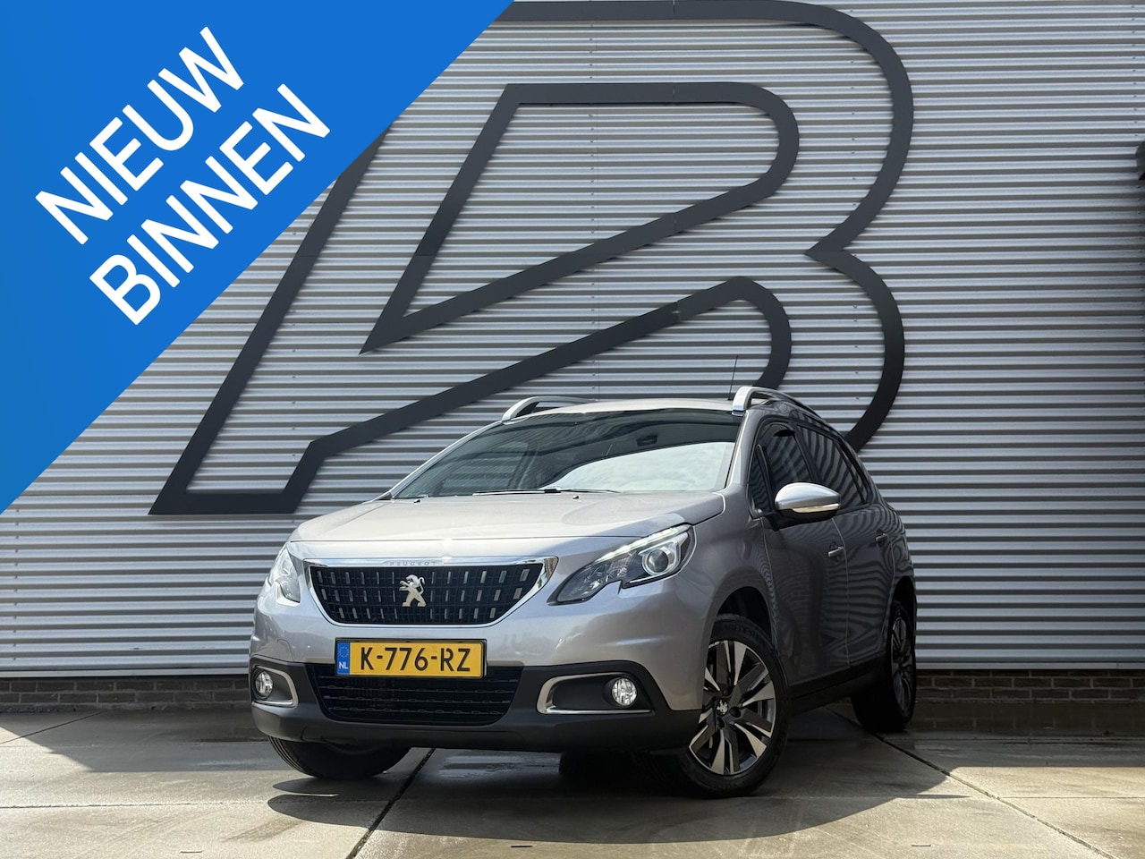 Peugeot 2008 - 1.2 PureTech Allure Navi|Camera|D-riem vv in 2025|Cruise|Carplay|PDC|APK tot 10-2026 - AutoWereld.nl