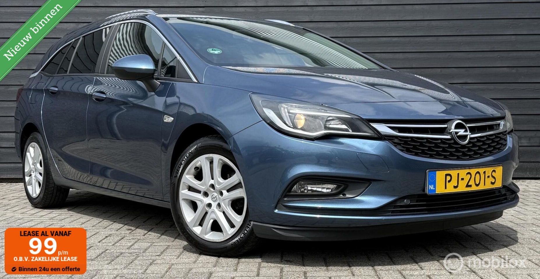 Opel Astra Sports Tourer - 1.6 CDTI Navi/Clima/Trekhaak/LED - AutoWereld.nl