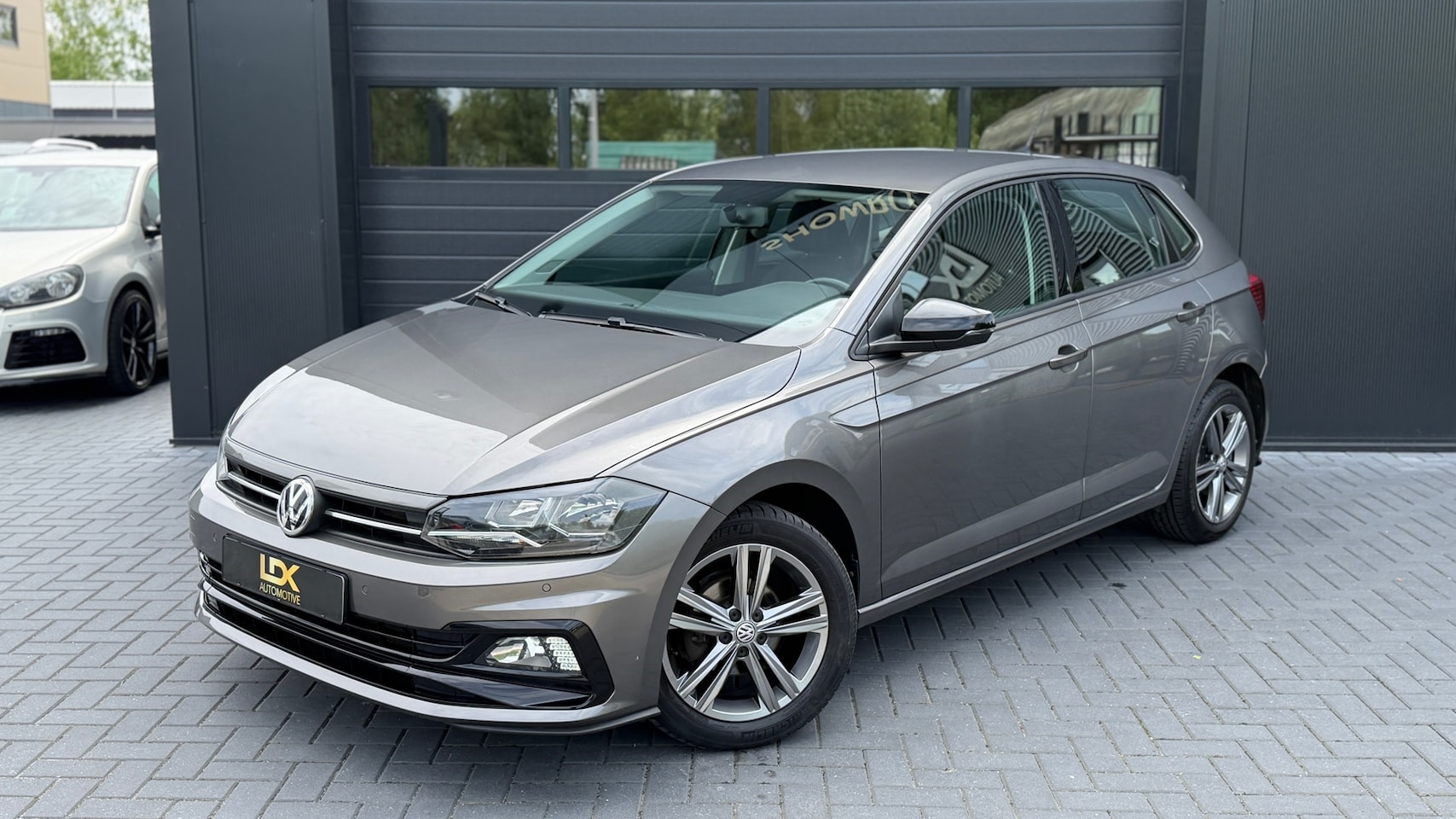 Volkswagen Polo - 1.0 TSI Comfortline R-Line|Airco|PDC - AutoWereld.nl