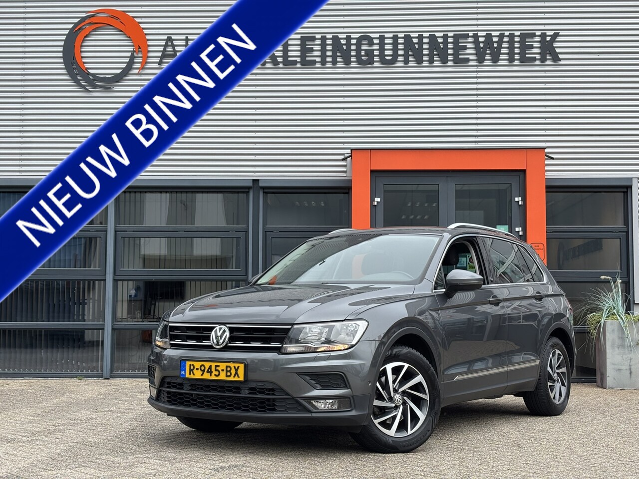 Volkswagen Tiguan - 1.4 TSI ACT SOUND Edition / Stoel & Stuurverwarming / Trekhaak Wegklapbaar / Allseason Ban - AutoWereld.nl