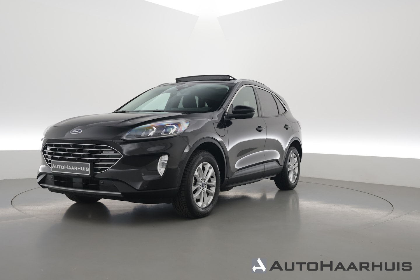 Ford Kuga - 2.5 PHEV Titanium | SOH 85.6% | Pano | Winter Pack | Camera | Elek. Trekhaak | Keyless | H - AutoWereld.nl