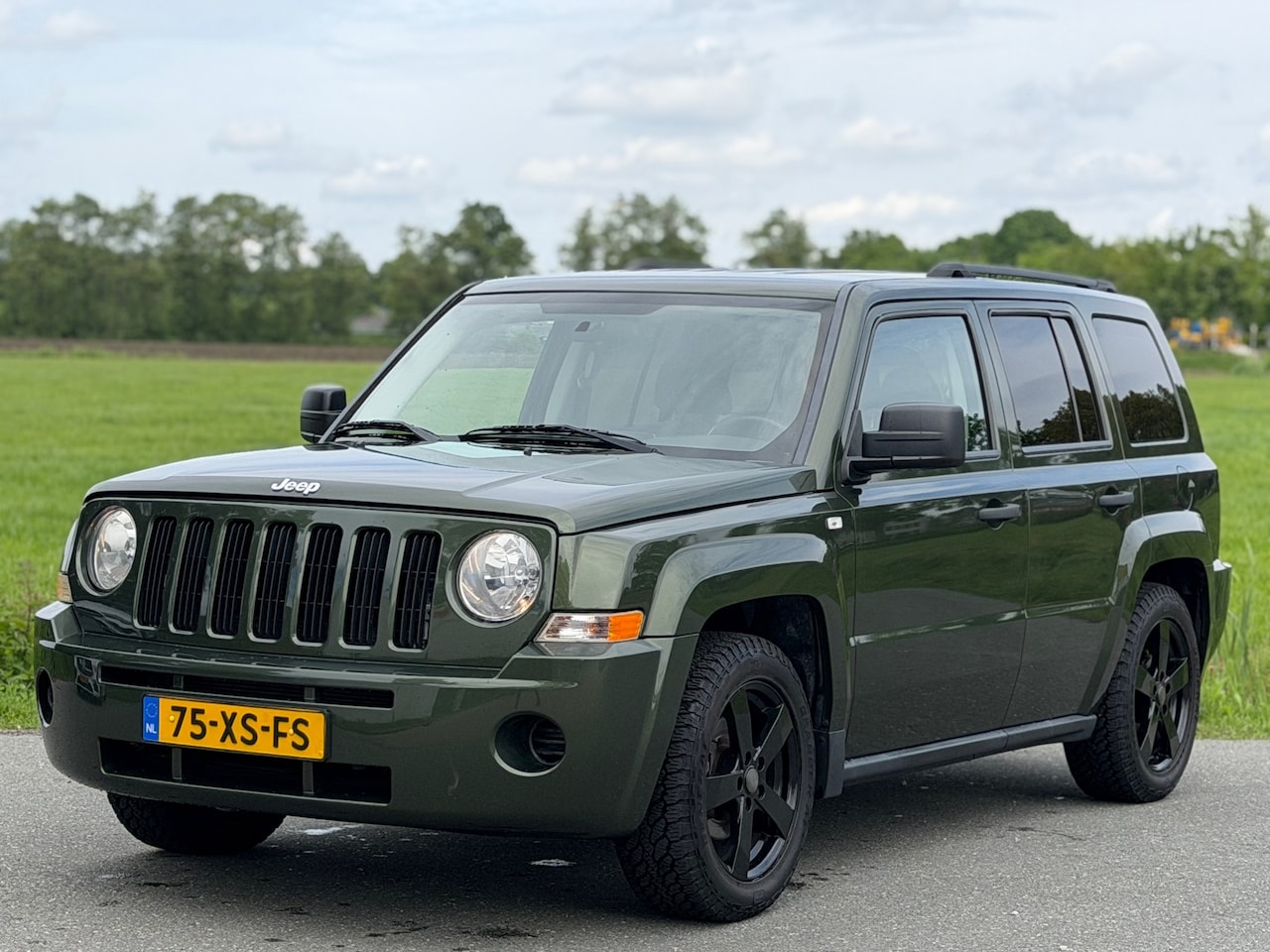 Jeep Patriot - 2.4 Limited | Nap | Netjes | Airco - AutoWereld.nl