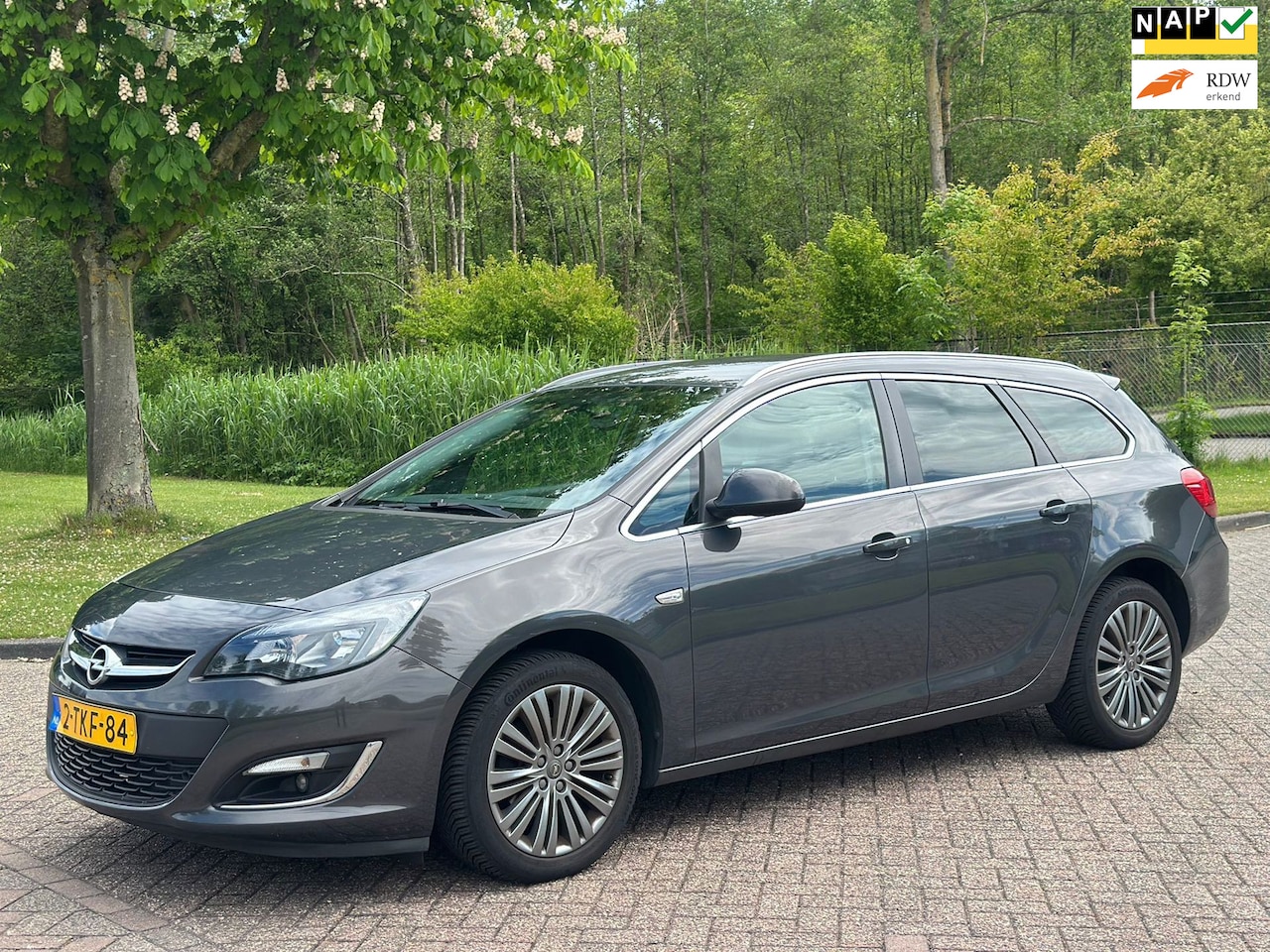 Opel Astra Sports Tourer - 1.4 Turbo Design Edition/AIRCO/CRUISE/NAVI/PARKEERSENS ACHTER/TREKHAAK - AutoWereld.nl