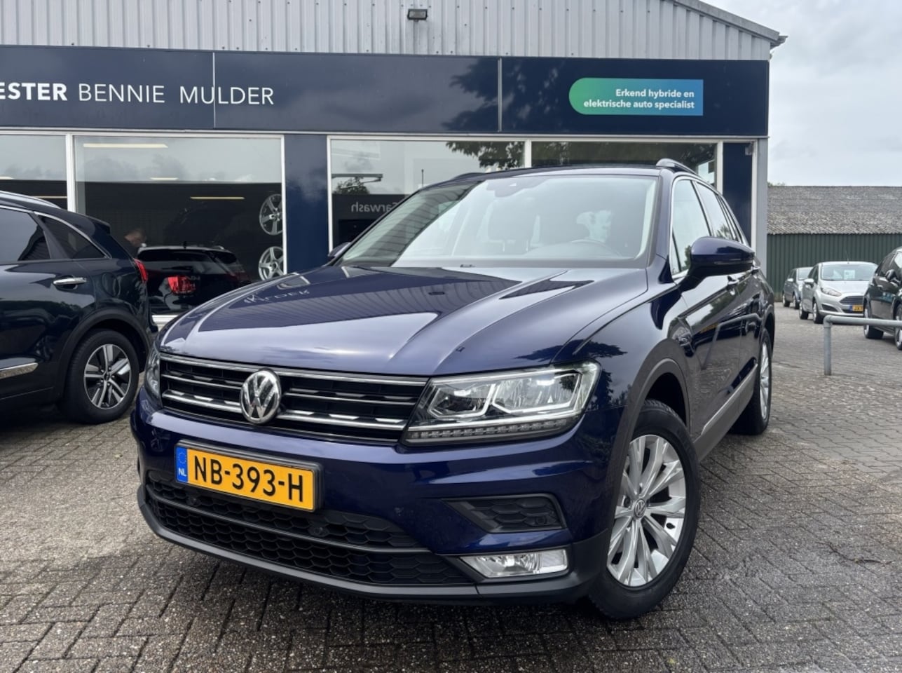 Volkswagen Tiguan - 1.4 TSI ACT Comfortline NAVI / TREKHAAK / AIRCO/ECC - AutoWereld.nl