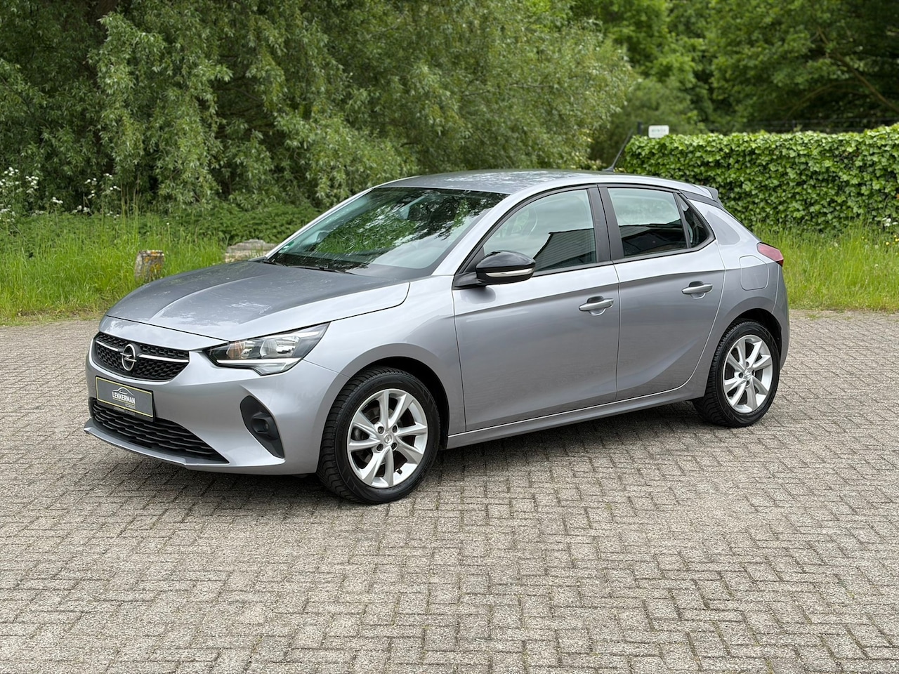 Opel Corsa - 1.2 Elegance PDC I CLIMA I NAVI I NWE DIS RIEM I ZEER MOOI - AutoWereld.nl