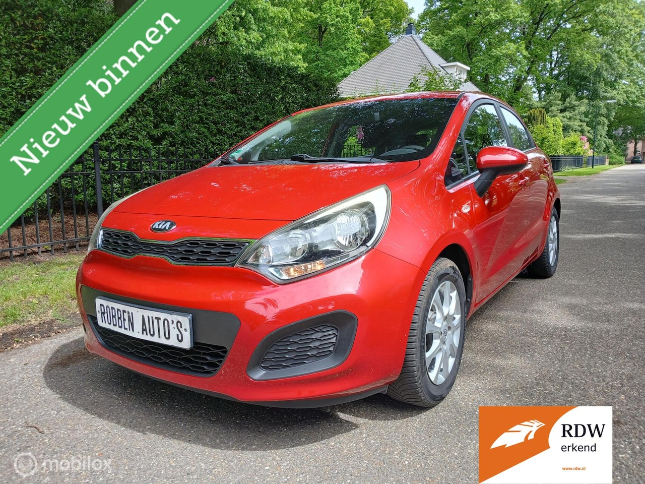 Kia Rio - red edition airco 5 deurs - AutoWereld.nl
