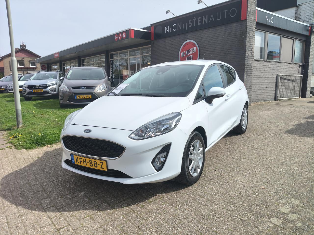 Ford Fiesta - 1.1 Airco, Navi, 14.160 km!! Car pass - AutoWereld.nl