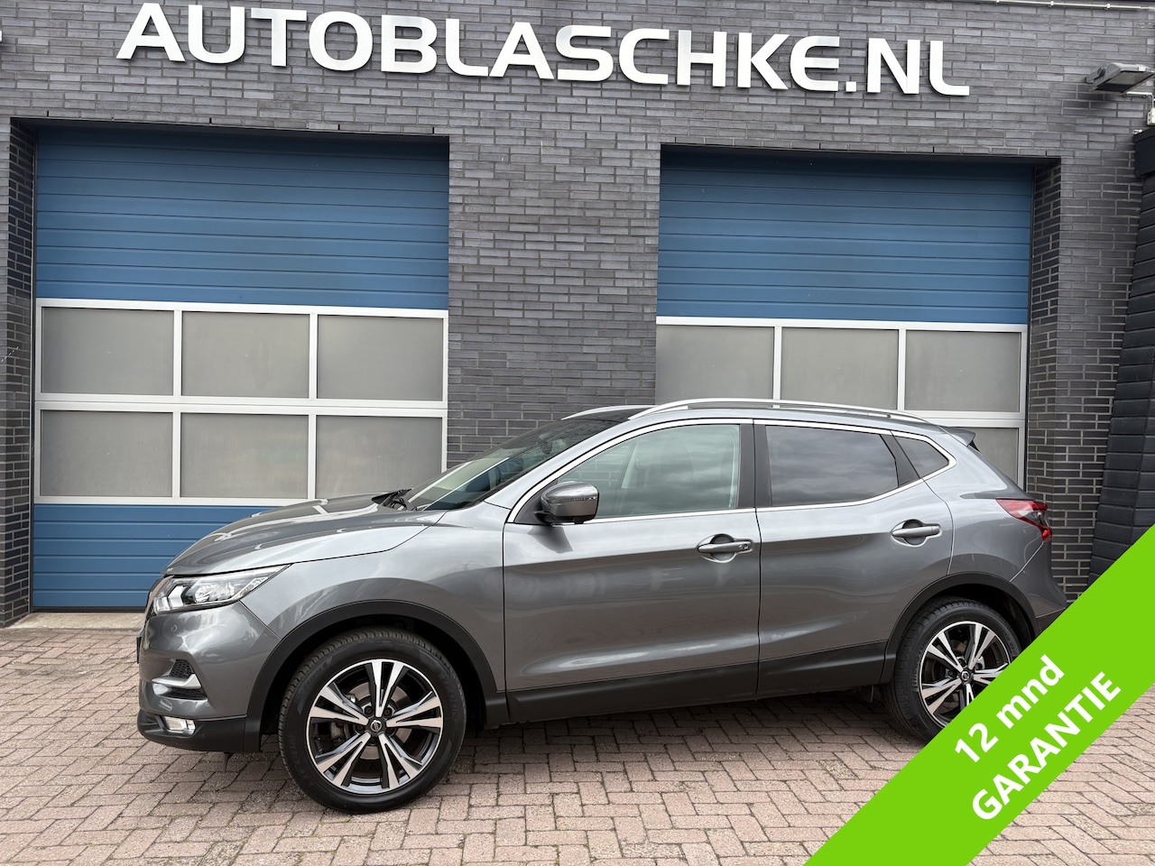 Nissan Qashqai - 1.2 N-Connecta 1.2 N-connecta , panodak, trekhaak, camera 360, cruise, climate, navi - AutoWereld.nl