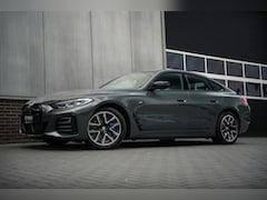 BMW i4 - M50 84 kWh 544 pk M-Sportpakket / BTW-Auto/ Dravitgrau/ Harman&Kardon/ Keyless/ Led-Koplam