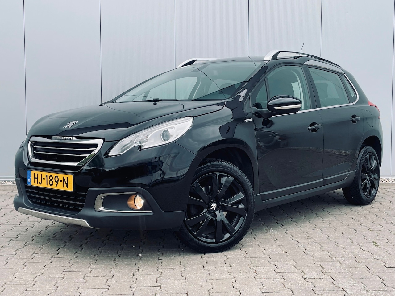 Peugeot 2008 - 1.2 PureTech Urban Cross 1.2 PureTech Urban Cross, Navi, Leder, Climate, Pdc - AutoWereld.nl