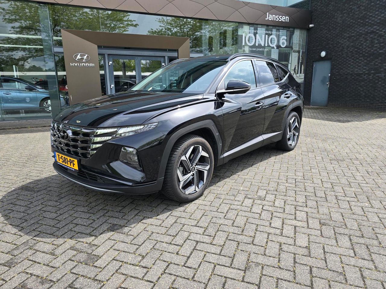 Hyundai Tucson - 1.6 T-GDI HEV Premium + trekhaak 1e eig. - AutoWereld.nl