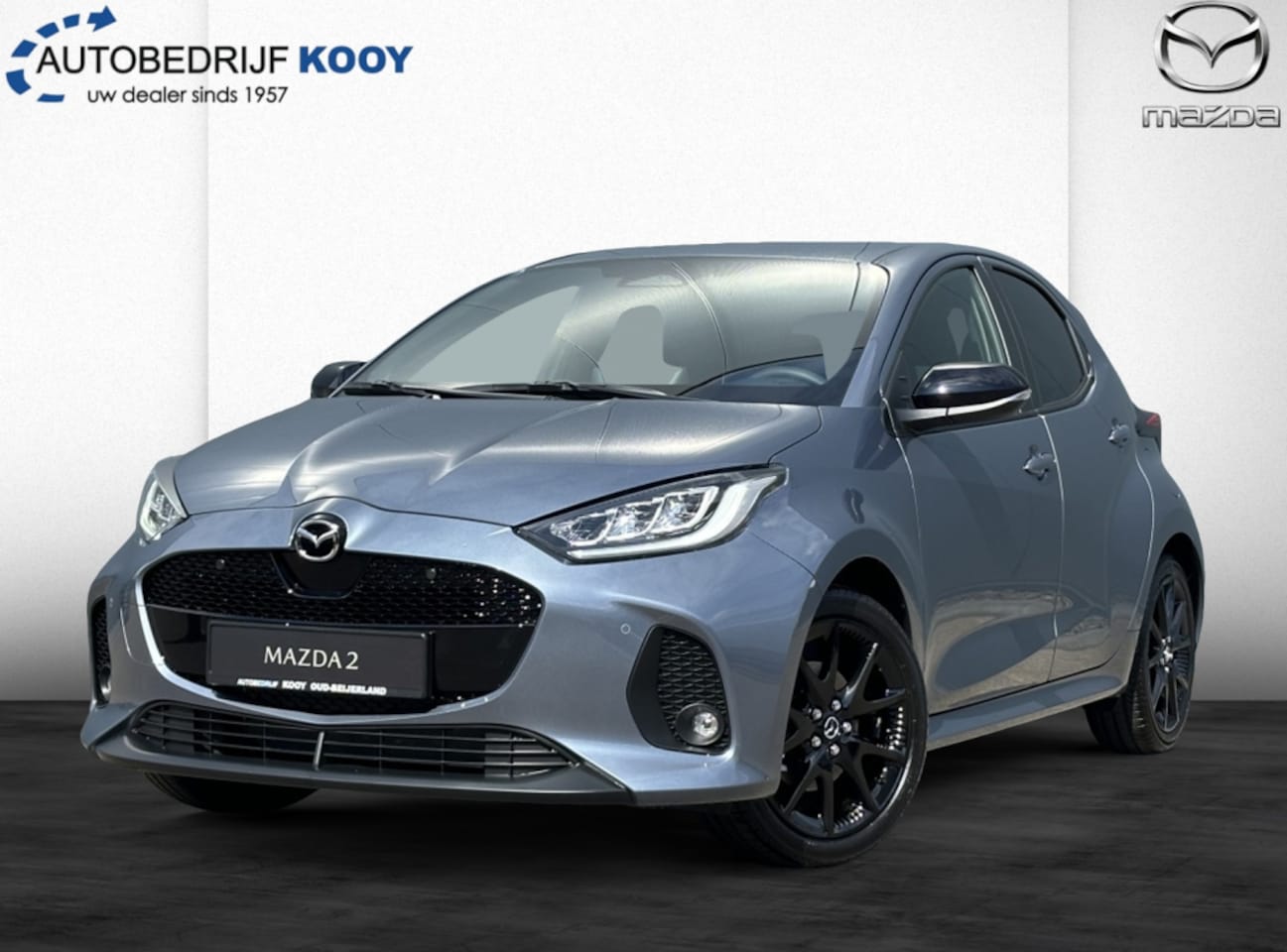 Mazda 2 Hybrid - 1.5 Homura / Uit Voorraad Leverbaar! / Nieuwe kleur: Sky Grey - AutoWereld.nl