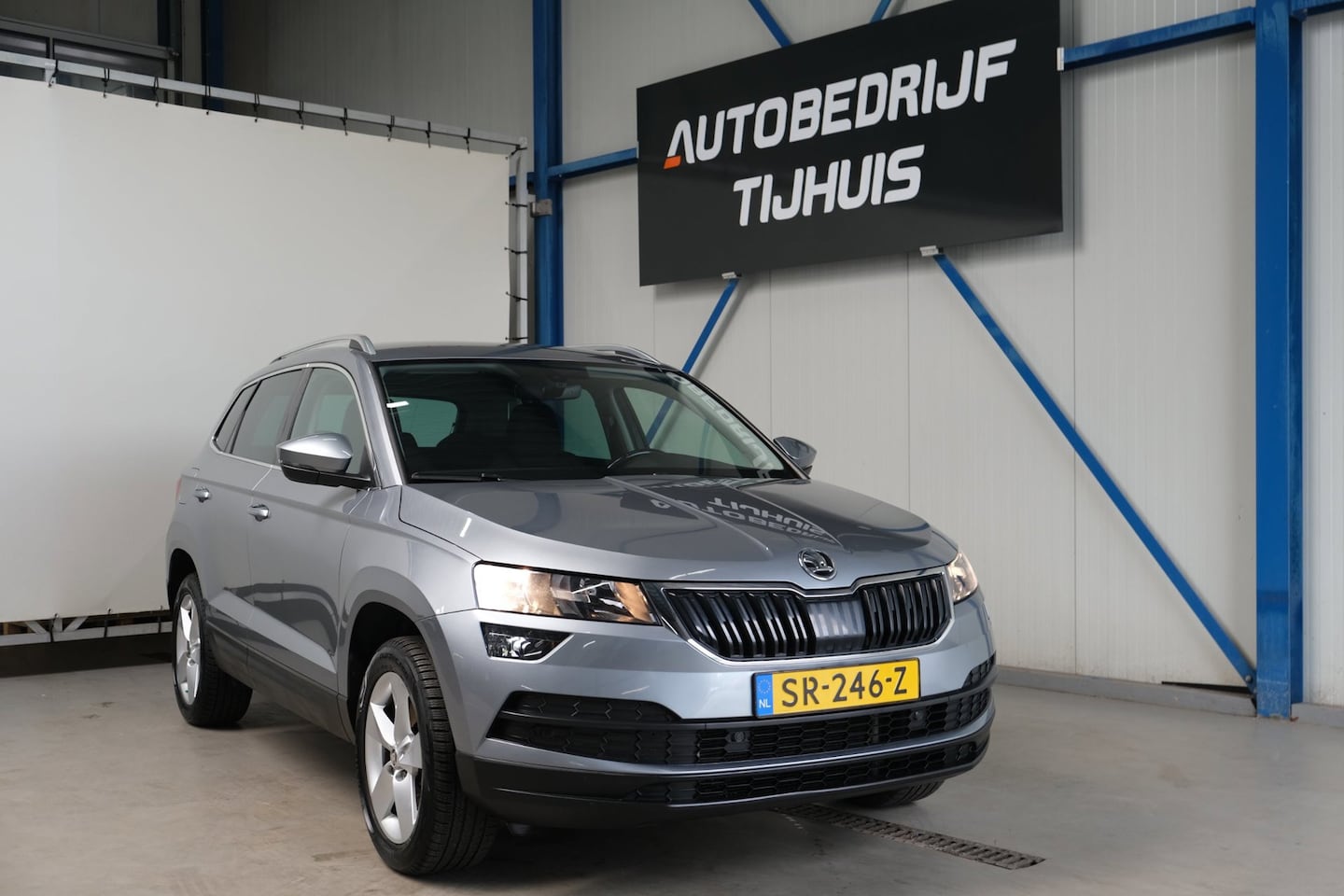 Skoda Karoq - 1.5 TSI ACT Ambition Business Automaat - N.A.P. Airco, Cruise, Navi, PDC, Carplay, Trekhaa - AutoWereld.nl