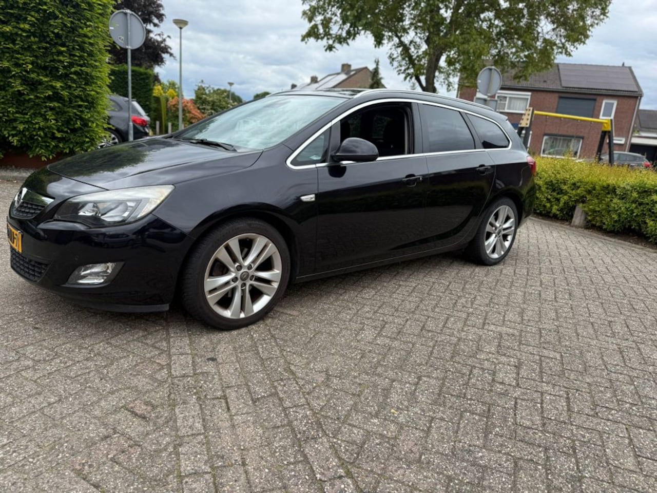 Opel Astra Sports Tourer - 1.6 Turbo Sport 1.6 Turbo Sport - AutoWereld.nl