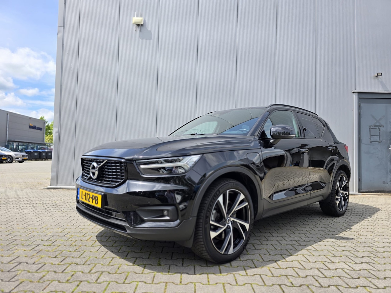 Volvo XC40 - T4 Recharge R-Design | 20" Velgen | Lederen interieur | Stuurwiel verwarming - AutoWereld.nl