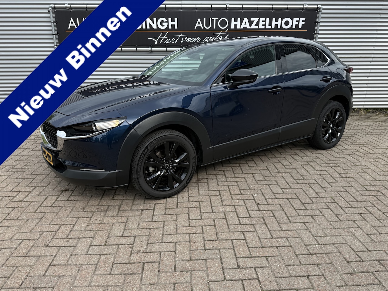 Mazda CX-30 - 2.0 e-SkyActiv-G M Hybrid Sportive | Stoelverwarming | Camera | Clima | Keyless | LED | El - AutoWereld.nl