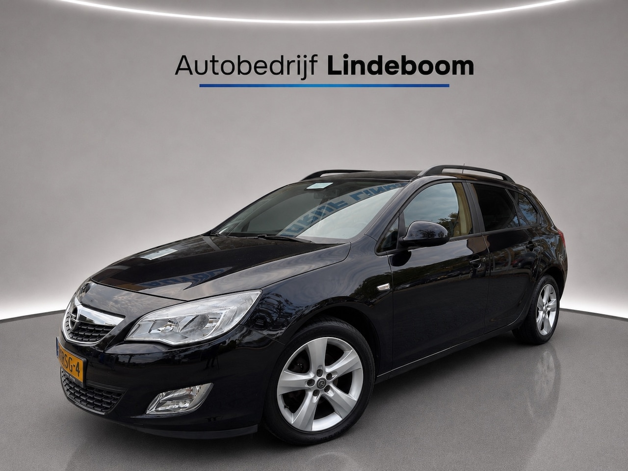 Opel Astra Sports Tourer - 1.4 Edition Trekhaak,Airco,Cruise control - AutoWereld.nl